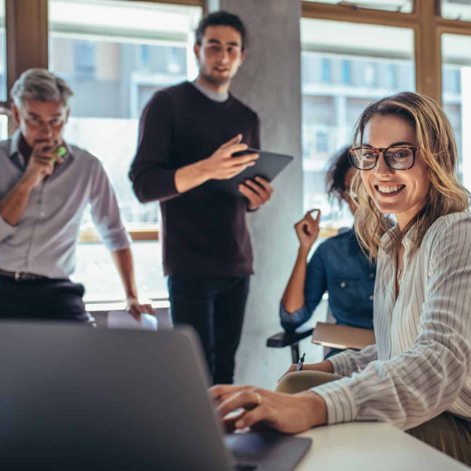 diverse professionals strategizing SEO