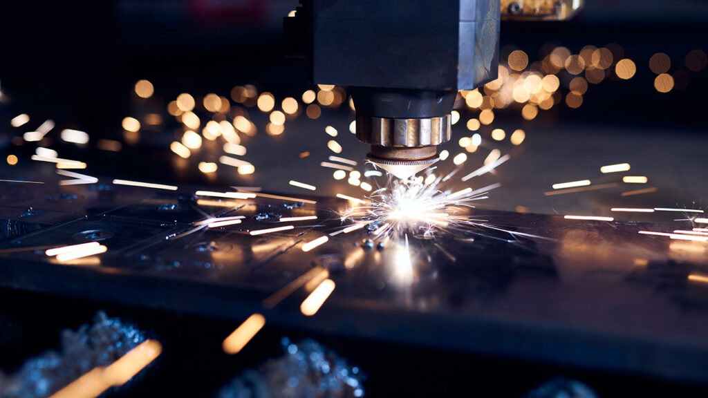 Image of a laser cutting through metal