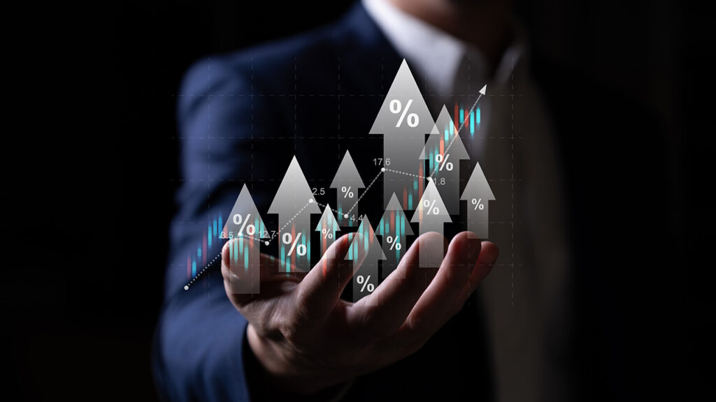 Man in a suit with his right hand outstretched and open with illustrations of arrows and a line graph above the hand