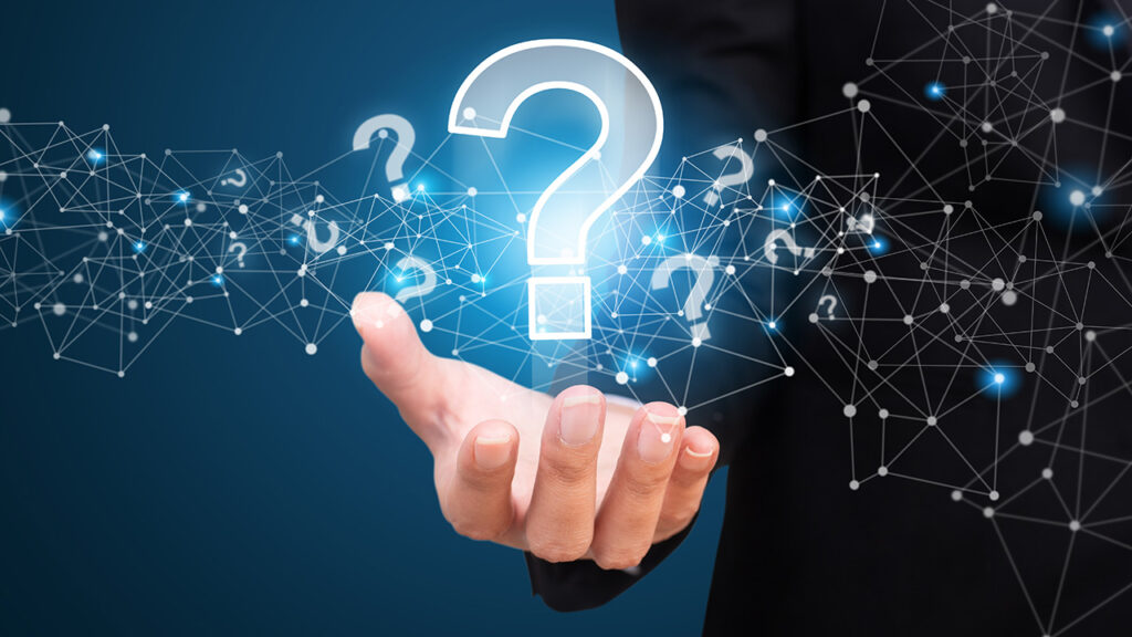 Image of a woman in a suit with illustrated questions marks over her outstretched hand