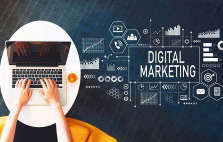 Person typing on a laptop with icons representing aspects of marketing